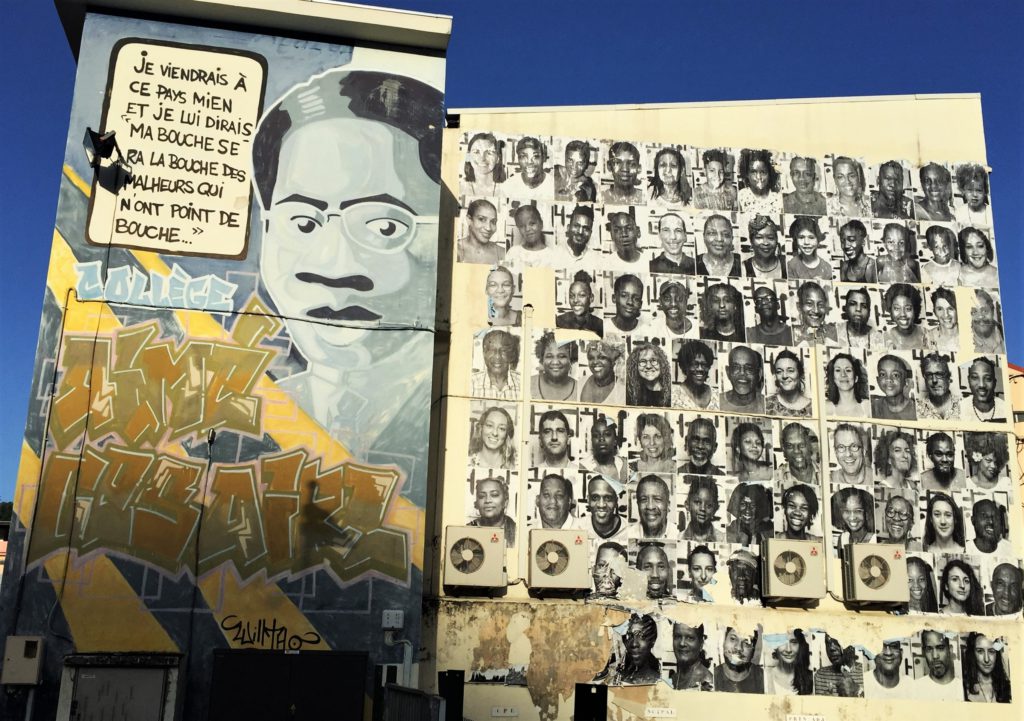 Oeuvre street art représentant Aimé Césaire et des portrait de Martiniquais